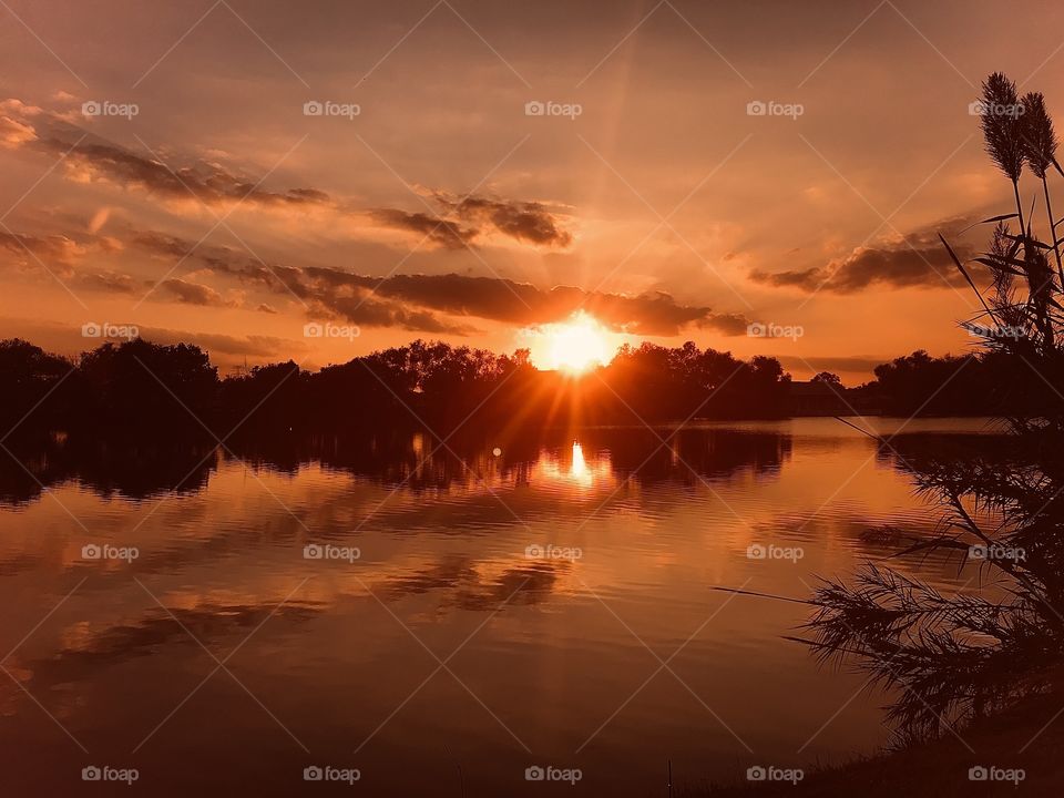 Absolutely a Gorgeous Breathtaking Twilight to Night Photo. The Sun is hanging around not letting go but you know it will have to happen Night is creeping up on this Ole boy here