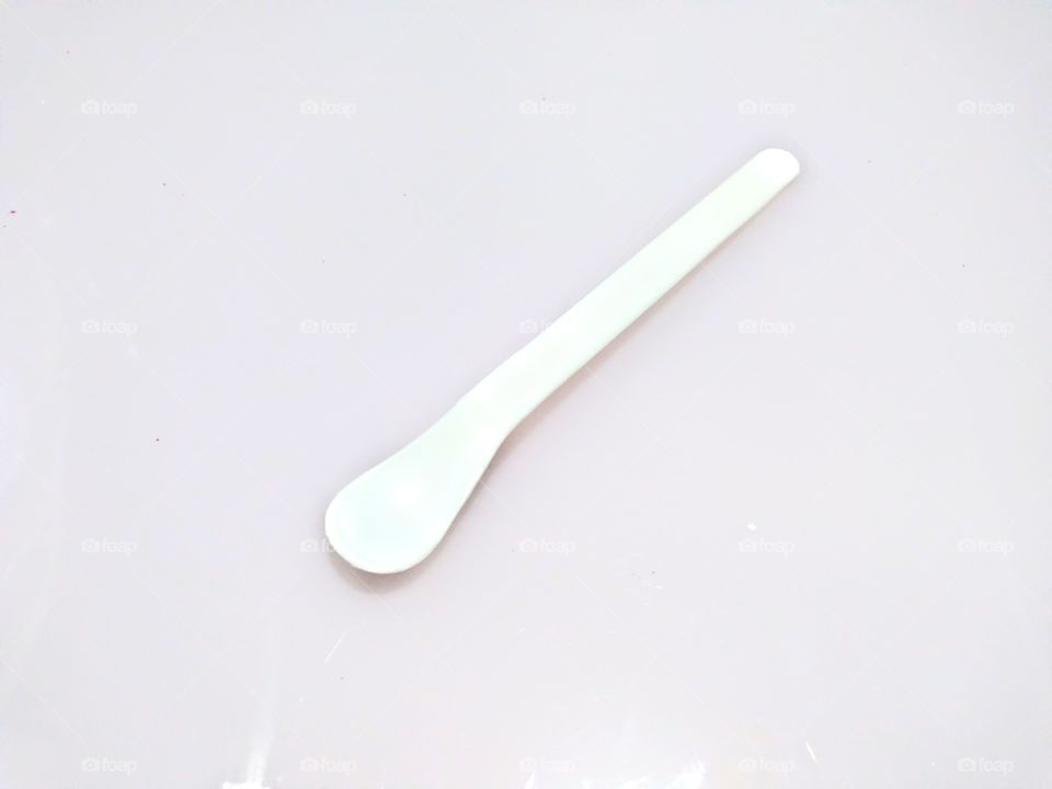 plain plastic spoon