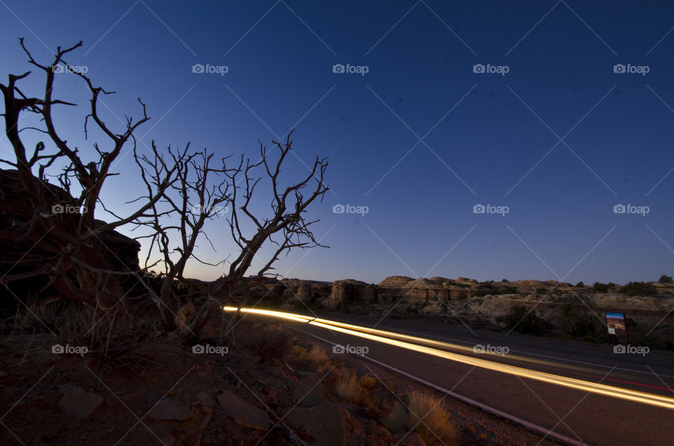 a long exposure of headlights in Canyonlands National Park