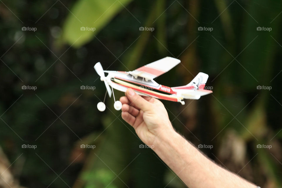 airplane flying rain hand by nader_esk