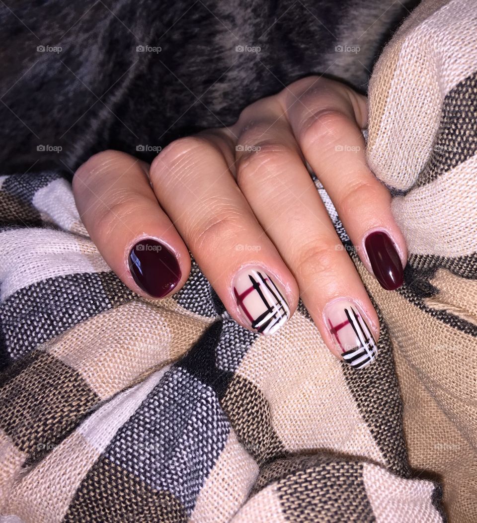 Nothing says fall like a Burberry-inspired manicure. 