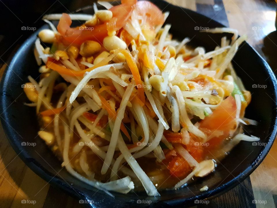 Papaya salad is a local food of the northeast region of Thailand.