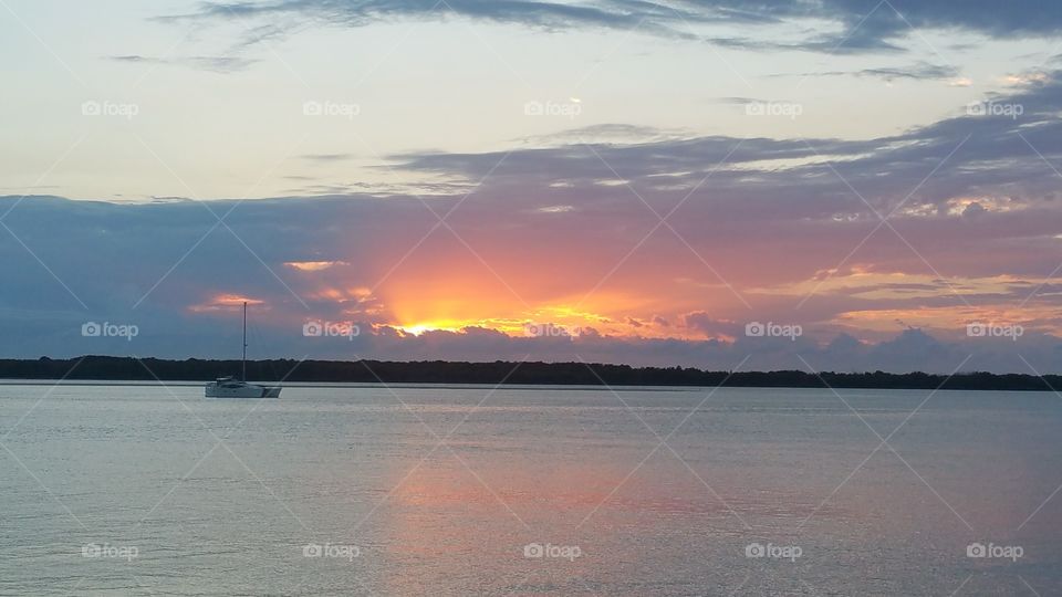 Coastal Dawn peaking through the clouds