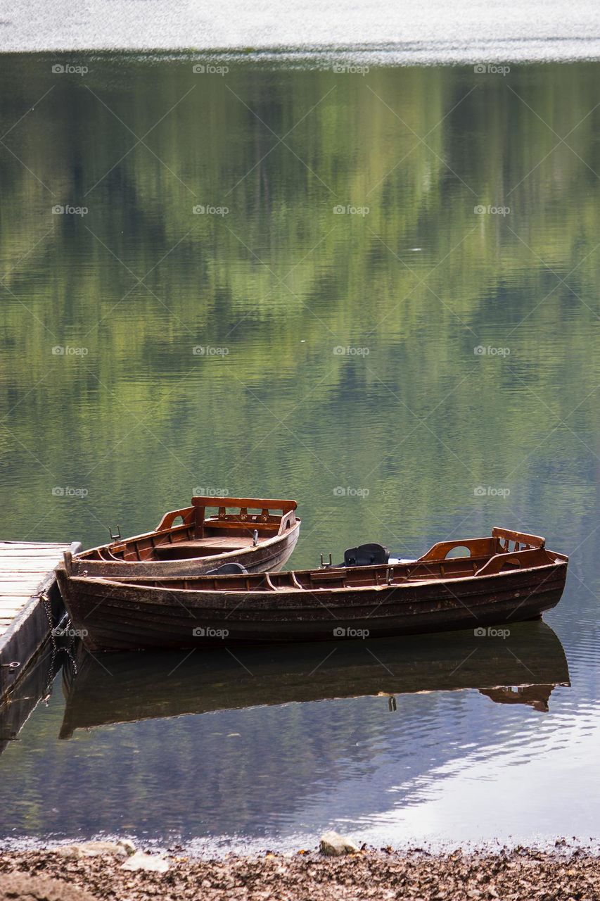 Boats on mountain lake