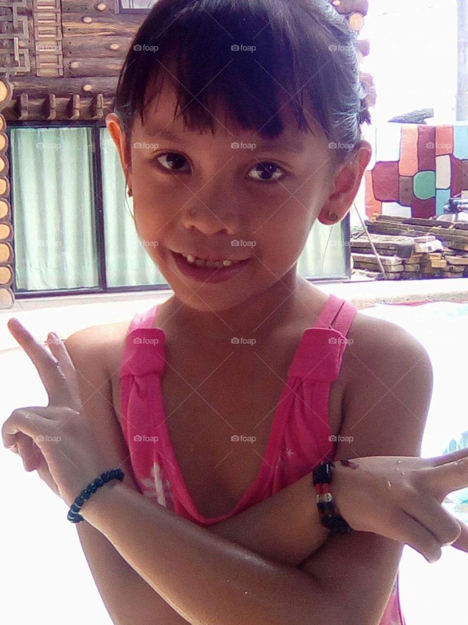 Our 6 year old  daughter Sheikha on her first scouting trip at aged 6, in Lucena, Philippines.
