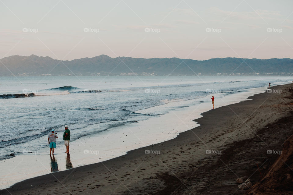 walking by the ocean in the evening