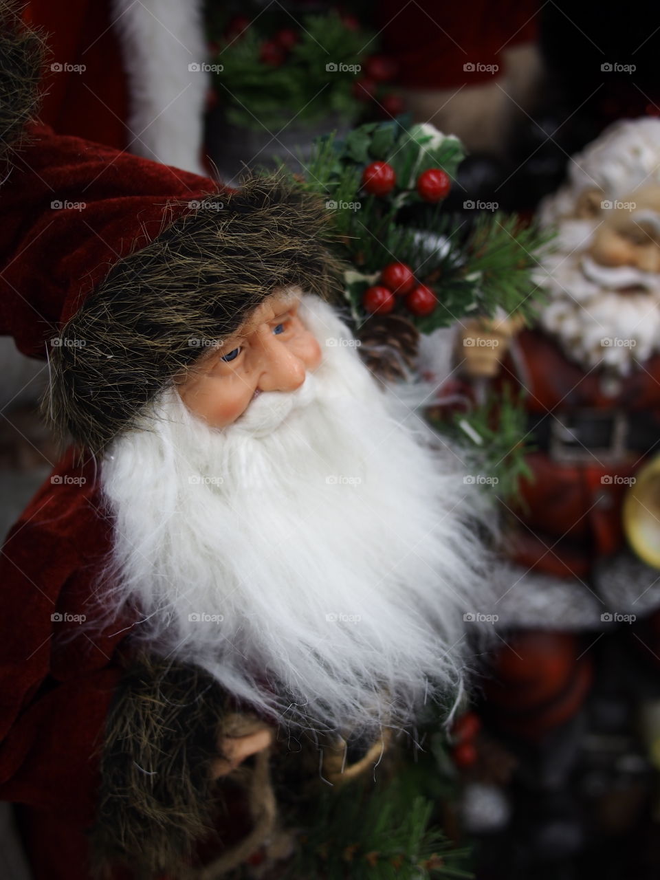 A Santa Clause figures with bushy beard and hat