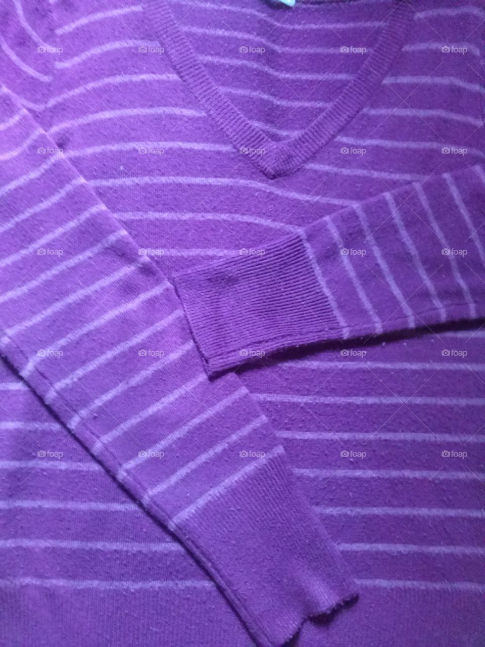 Close-up of purple sweater
