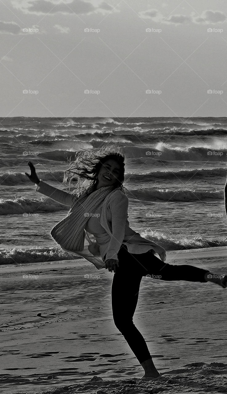 Jumping for joy on the sandy beach by the Gulf of Mexico!
A family from New England enjoying the warm breeze and sandy beach!