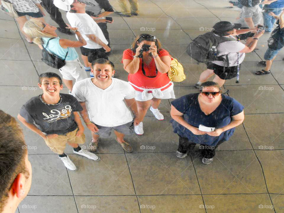 Selfie of four. Silly family selfie at the BEAN in Chicago's Millennium Park in downtown Chicago