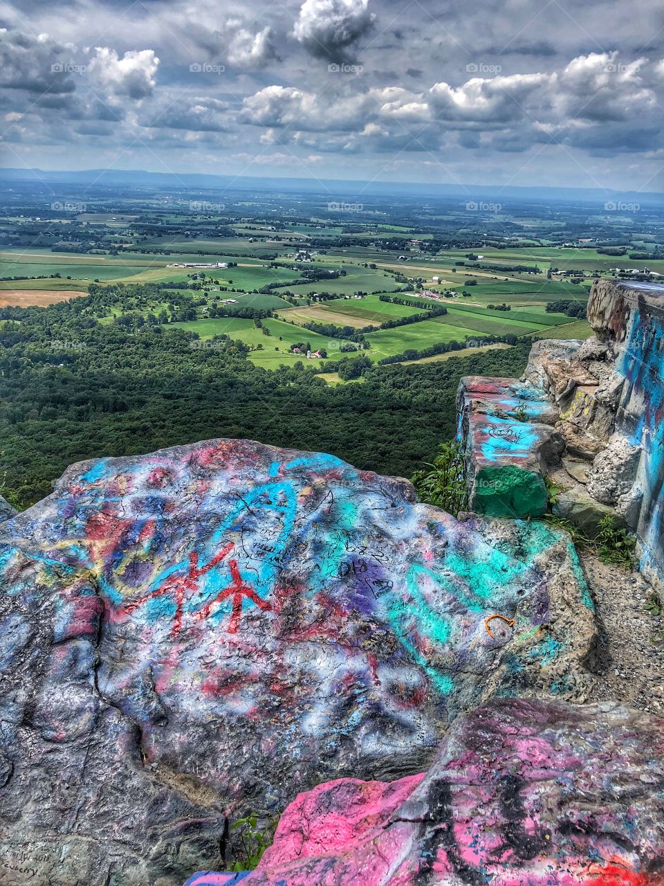 High rock lookout Maryland park painted graffiti boulders rocks view from up top 