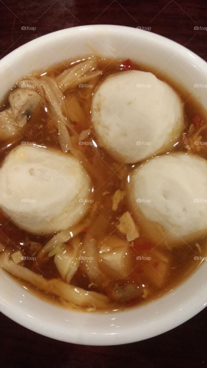 Hot and Sour soup. Yummy hot and sour soup with baked fish meatballs before the real meal.