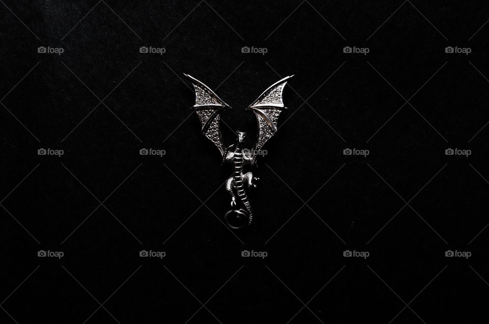 Silver dragon black background