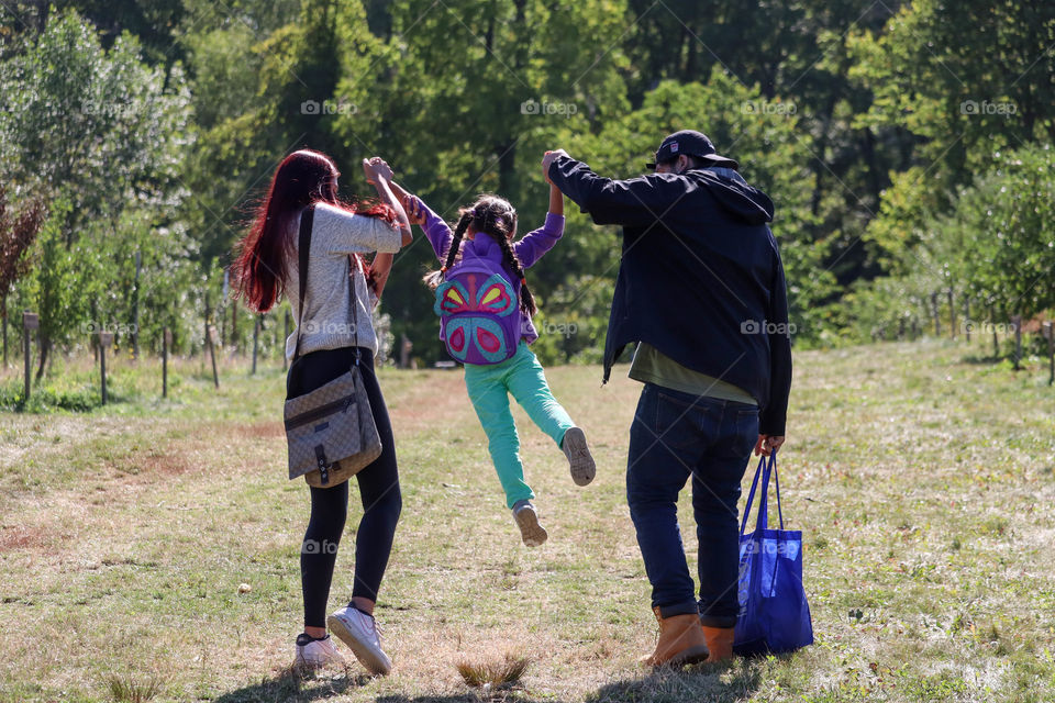 Happy family is having fun time outdoors