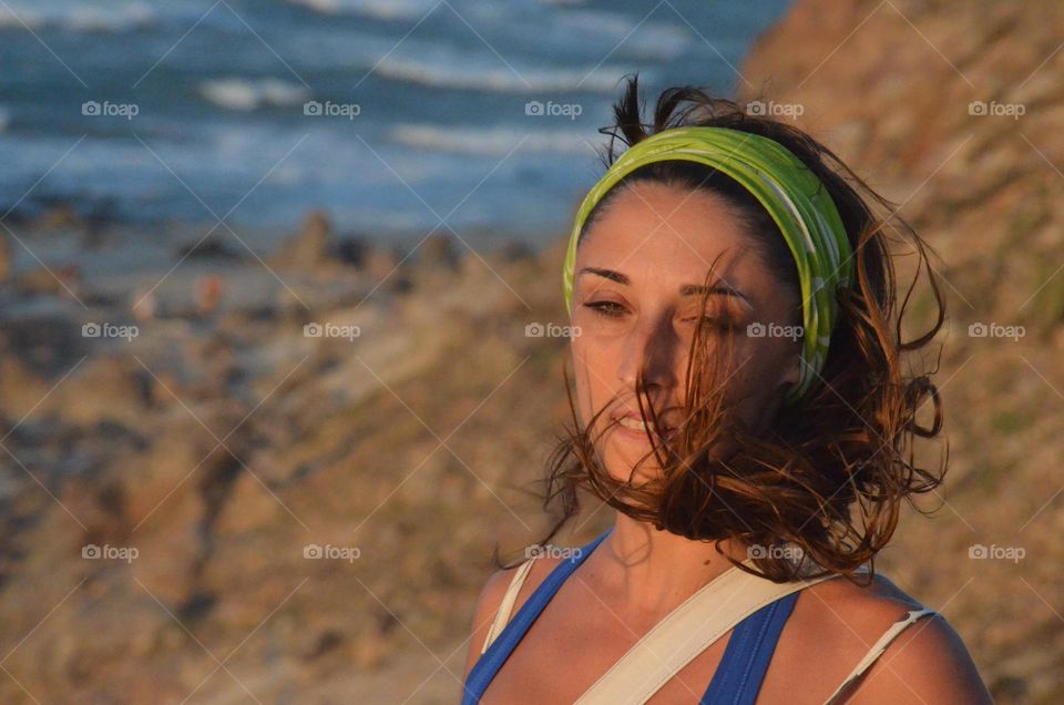 Woman with hair moving by wind 