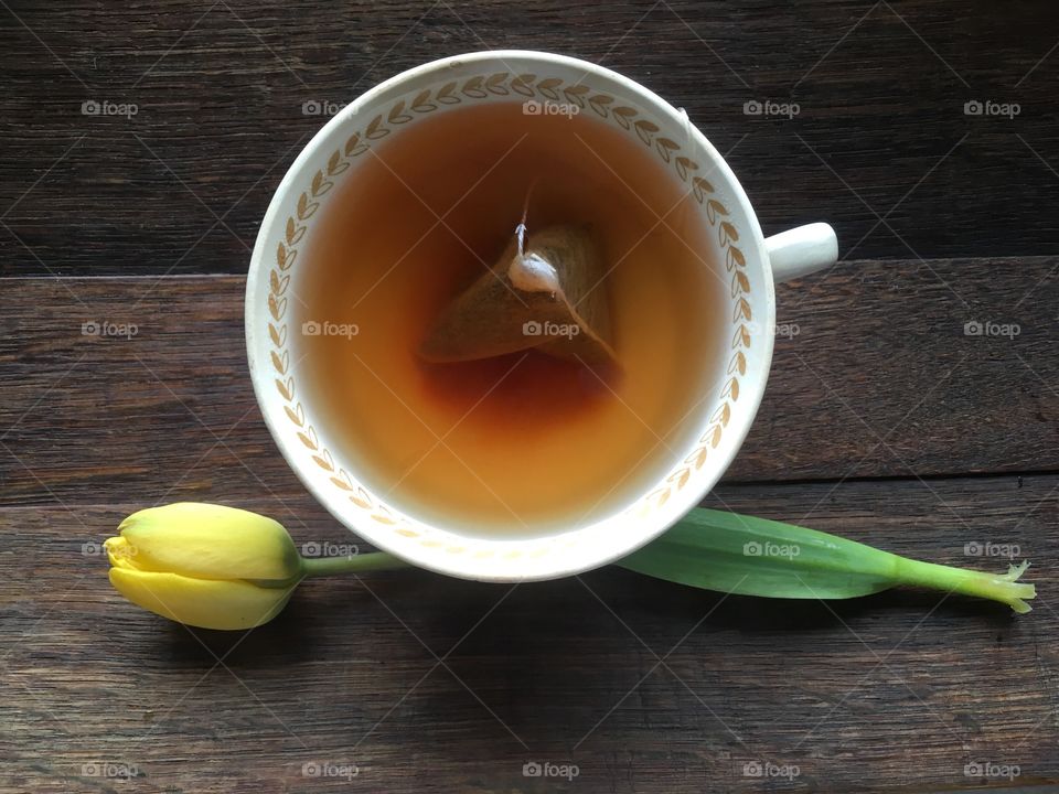 High angle view of tea cup with flower