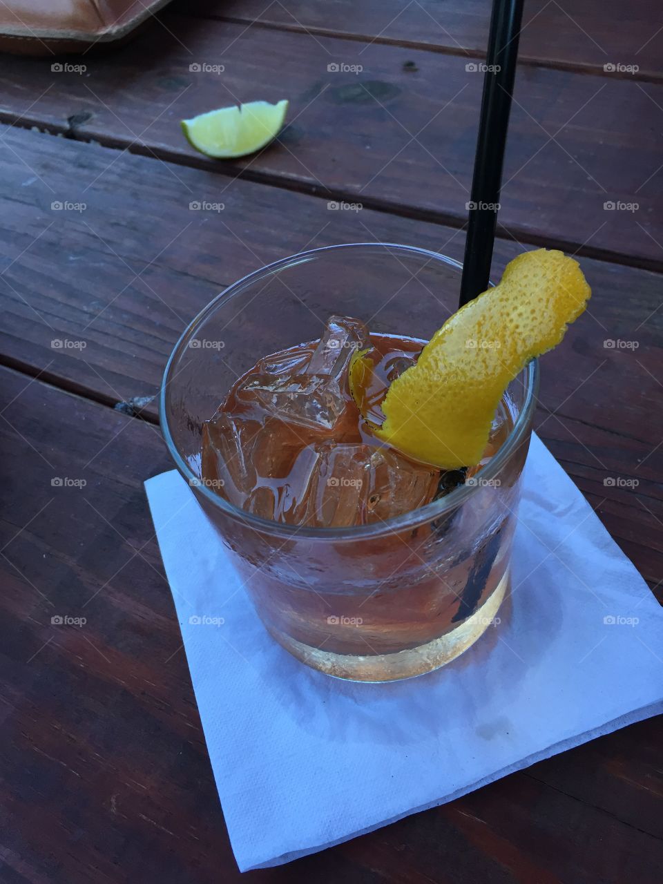 Summer refreshment. Cooling off with a cold old fashioned 