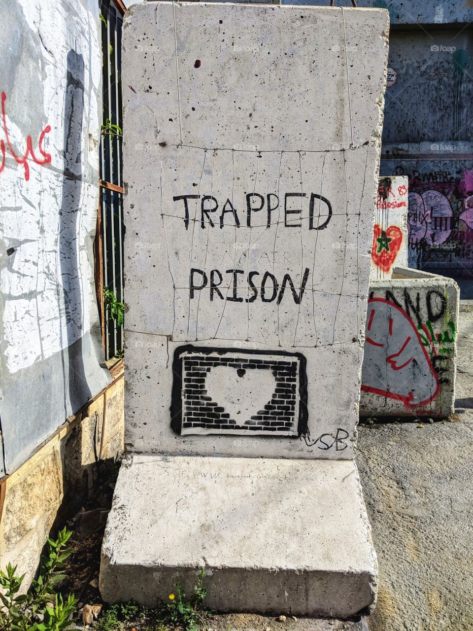 Trapped Prison Graffiti in the Bethlehem side of the Israeli Wall