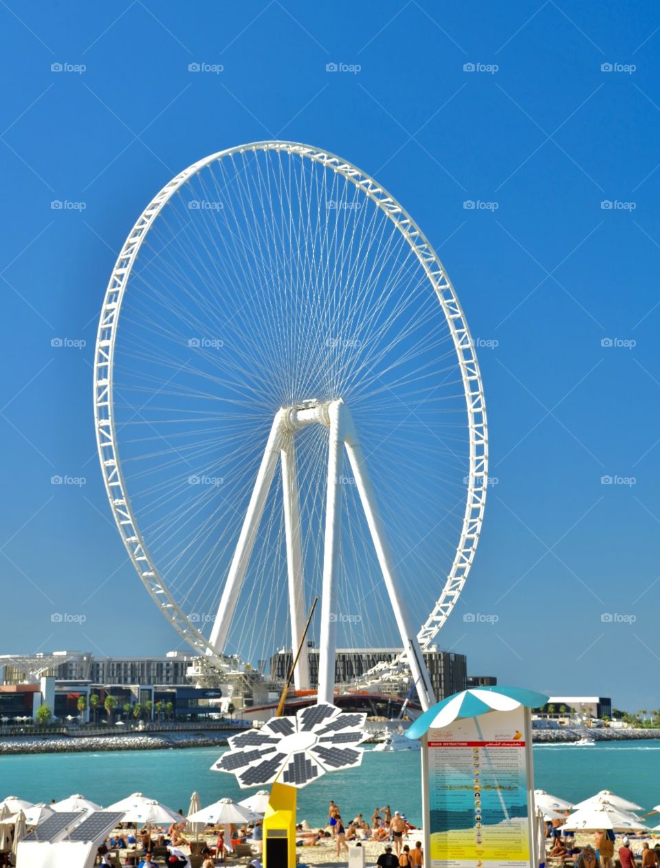 round big white wheel in the sea