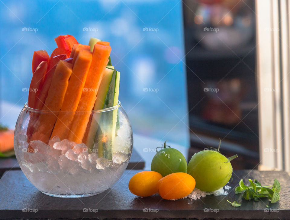 Vegetable with ice in jar