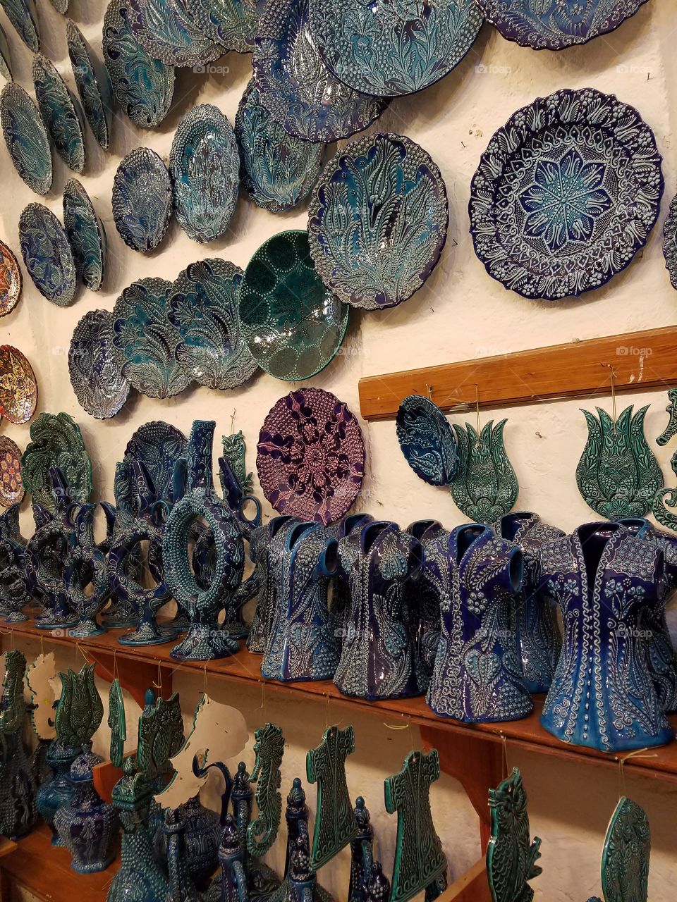 pottery covered walls in Cappadocia Turkey