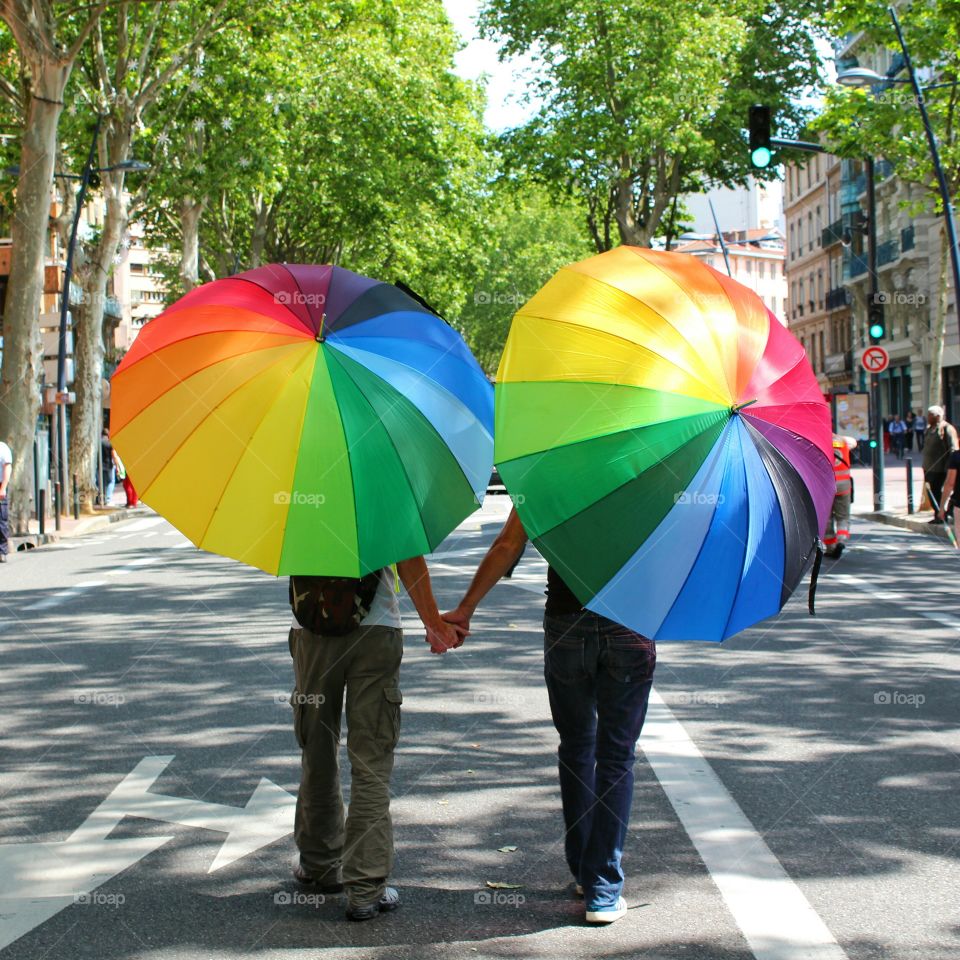 A gay couple holding hands in Toulouse, France