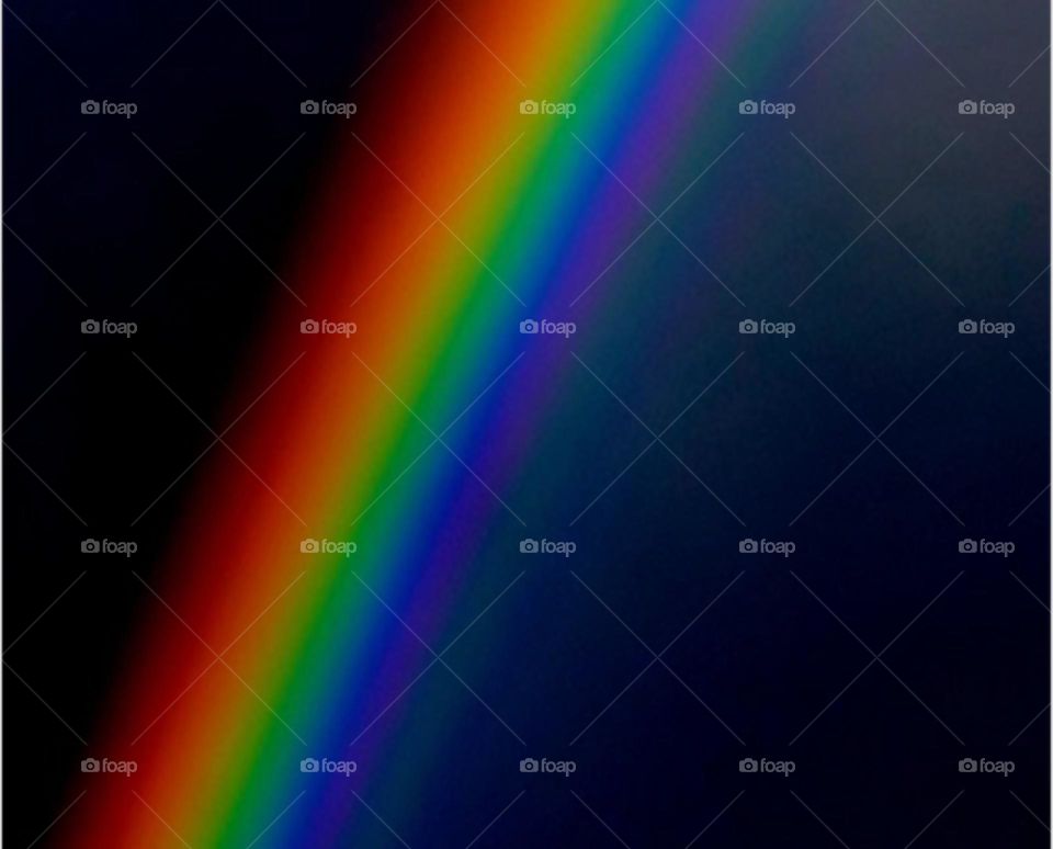 Photography of rainbow. Rainbow on black background.  Abstract web background. Banners and panels. Design background. Computer. Desktop background and design. Unique. Surrealistic. Dispersion of light