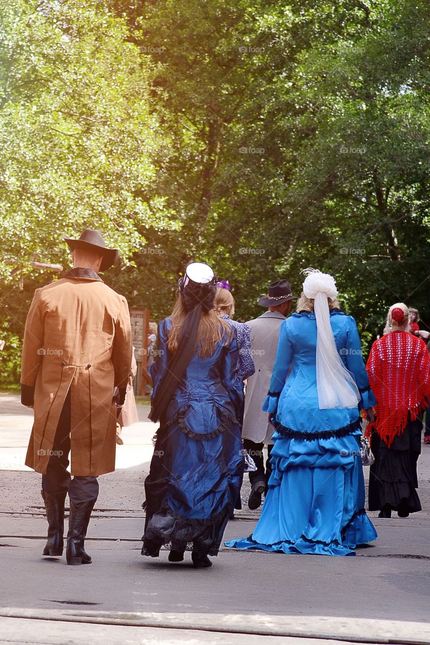 Vintage. People walking in old clothes