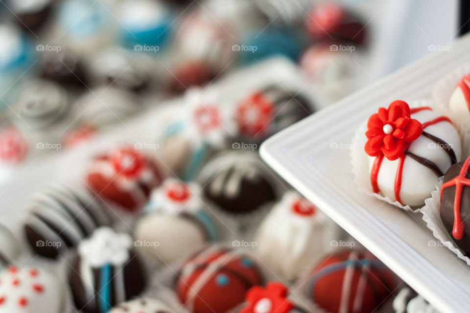 Tiers of decorated wedding cake pops