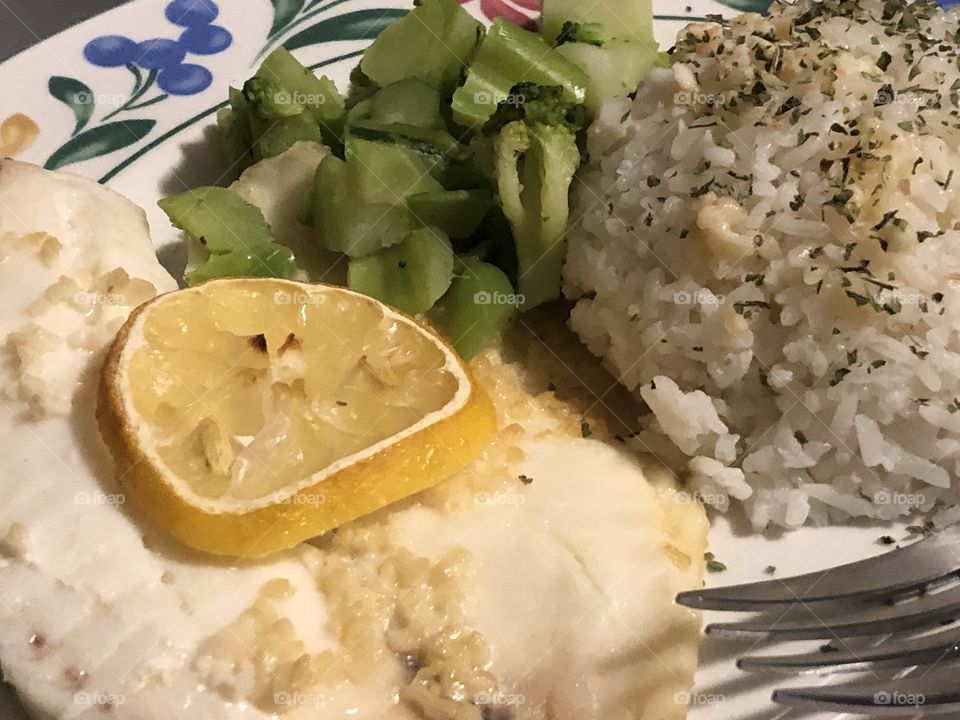 Lemon butter talapia and rice and broccoli