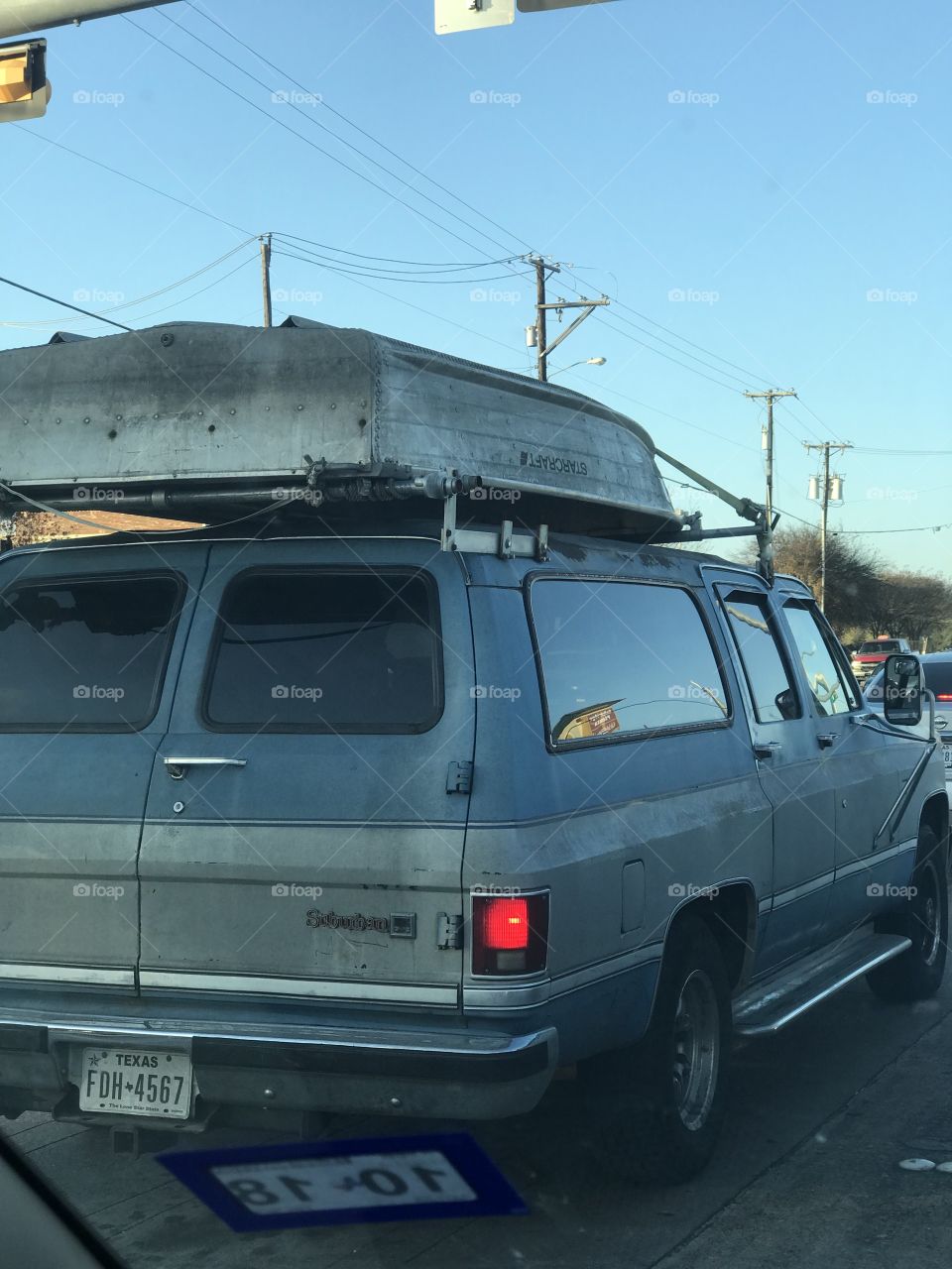GMC Suburban with a Starcraft Boat