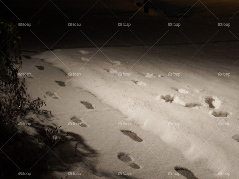 Footprints & Shadows on a snowy night