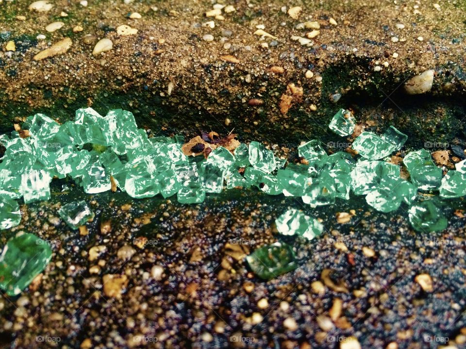 Close-up of green pieces of glass