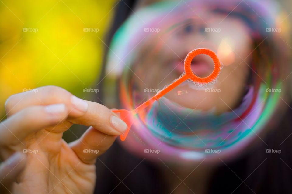 Girl blowing bubble