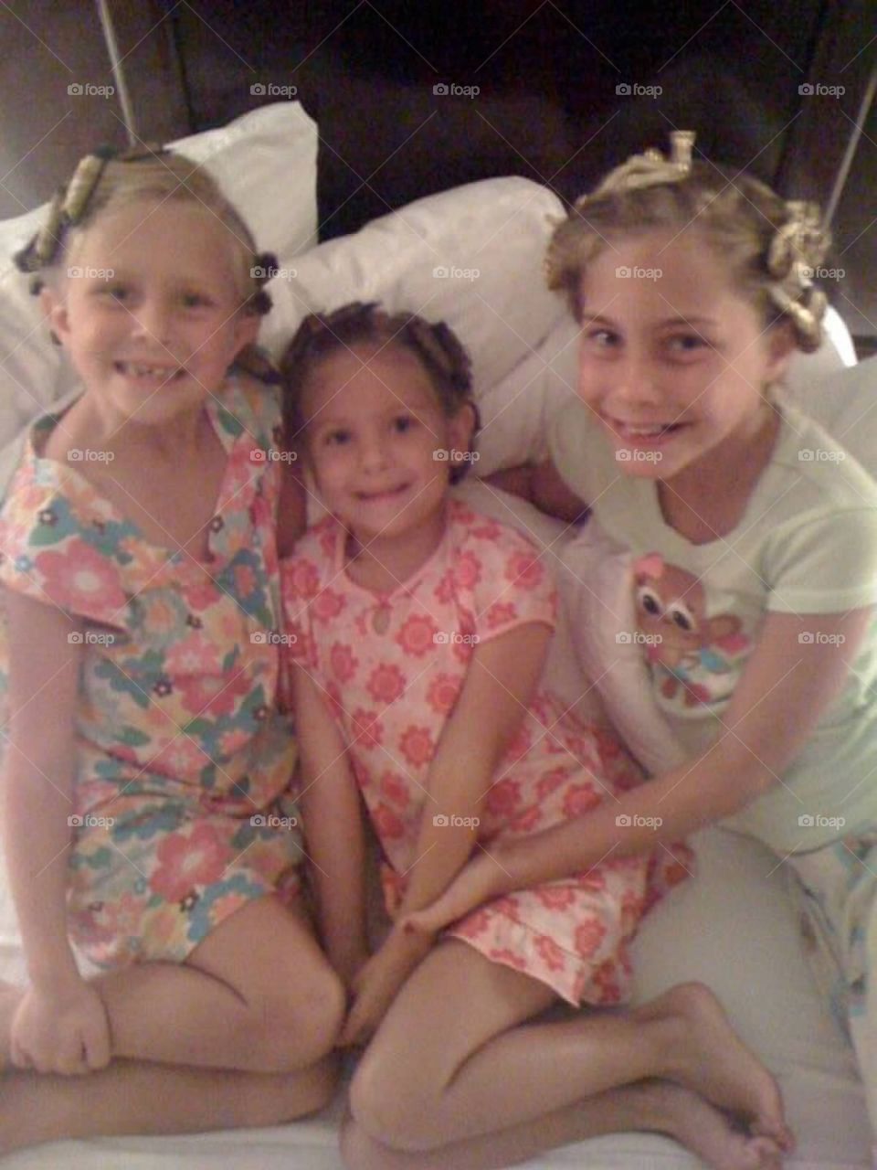Little girls in hair rollers
