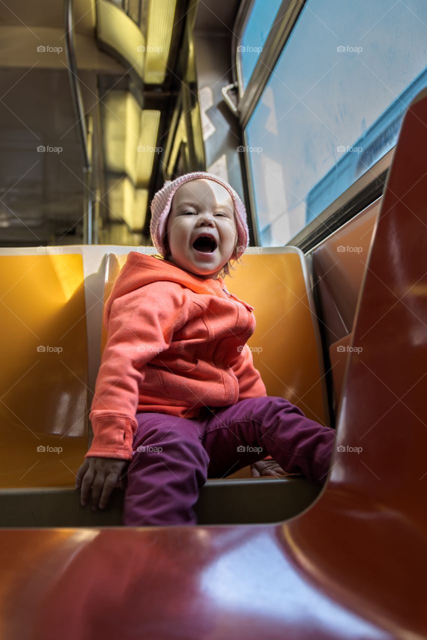Cute boy sitting in train