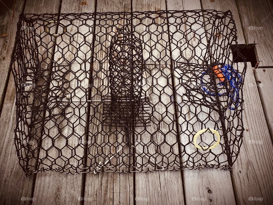 Crab pot on the dock all kinds of different shapes and sizes of shapes :)