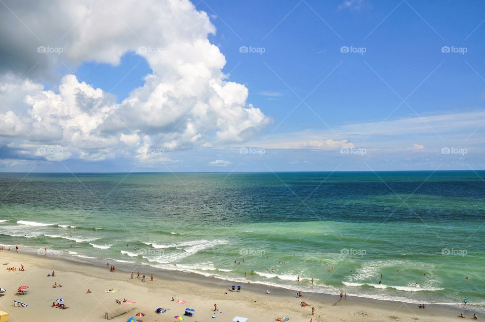 Who doesn't love the beach and ocean?! Heart-shaped cloud over the Atlantic Ocean. This is not Photoshop it was truly a work of nature.