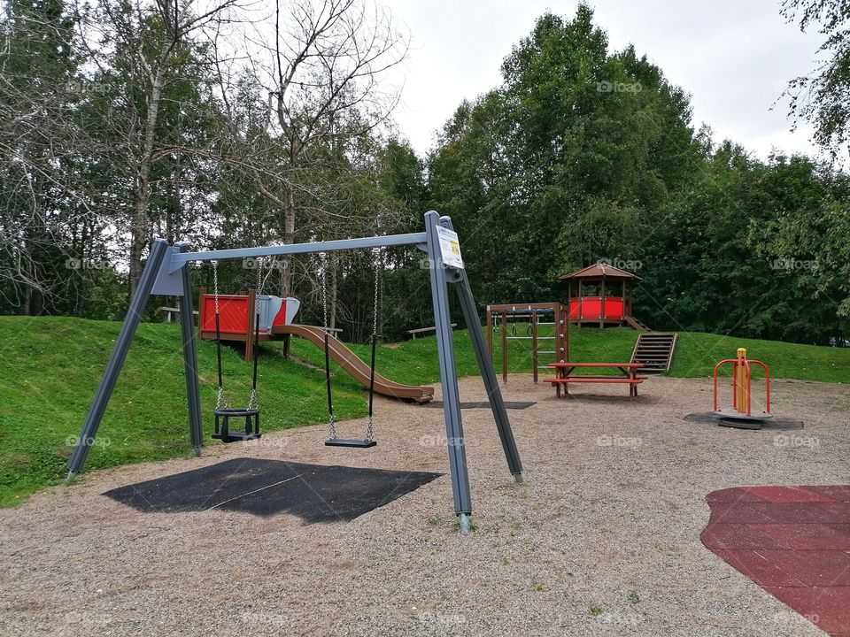 Playgrounds like the picture are really common in Finland. In almost every apartment building area in the yard you will find at least one play area for children.