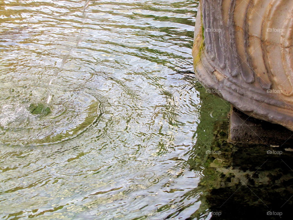 circular waves on the water and in the stone