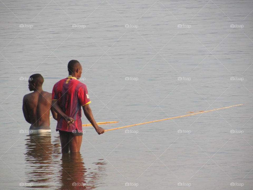 People doing traditional fishing