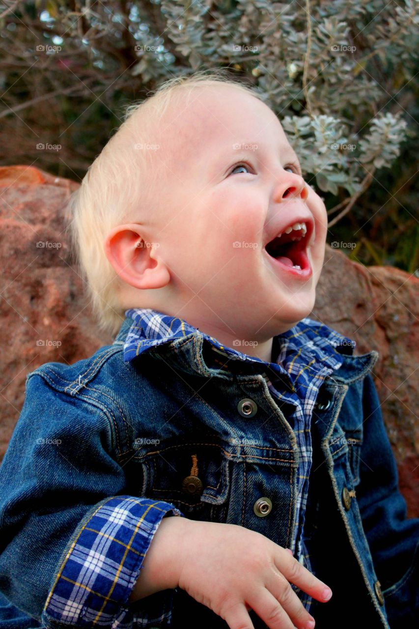 Small boy with mouth open