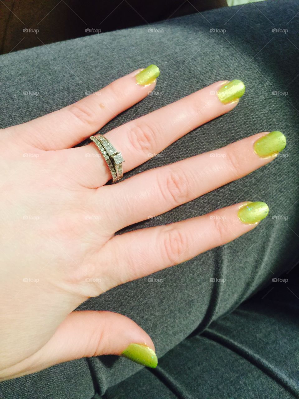 Wedding Ring and lime green nail polish