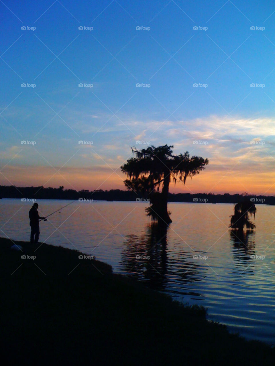 sunset lake fishing martin by laurissak