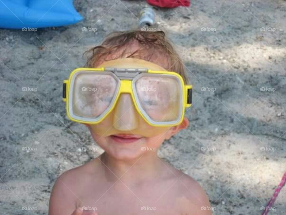 Fun with snorkle masks at the beach.