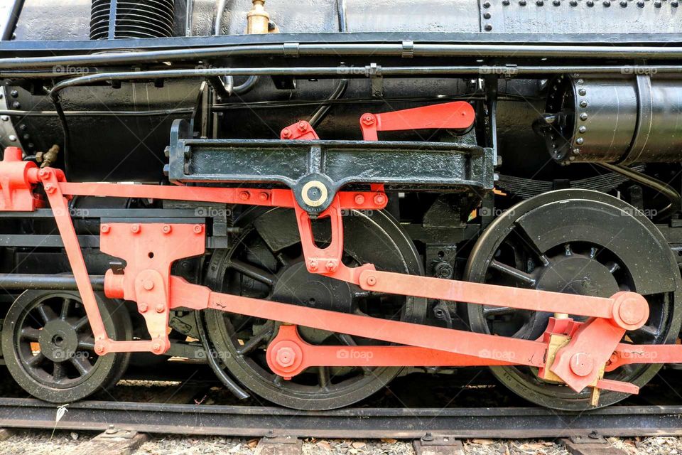 Rea and black steam train