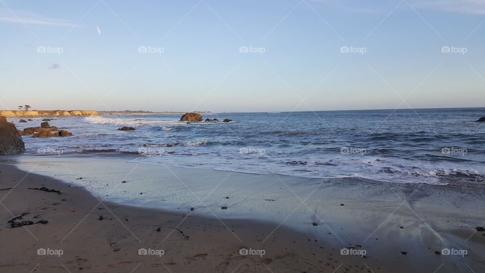 Tide coming in and breaking up on the coast of Pescadero. Just after dawn.