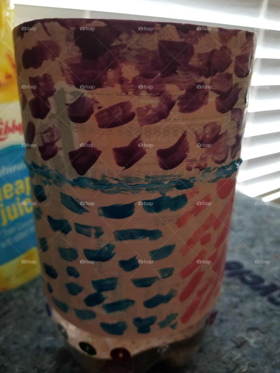 A pen holder made from recycled miniral water bottle 