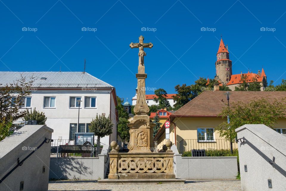 Cross in the background with the famous Czech castle Bouzov.