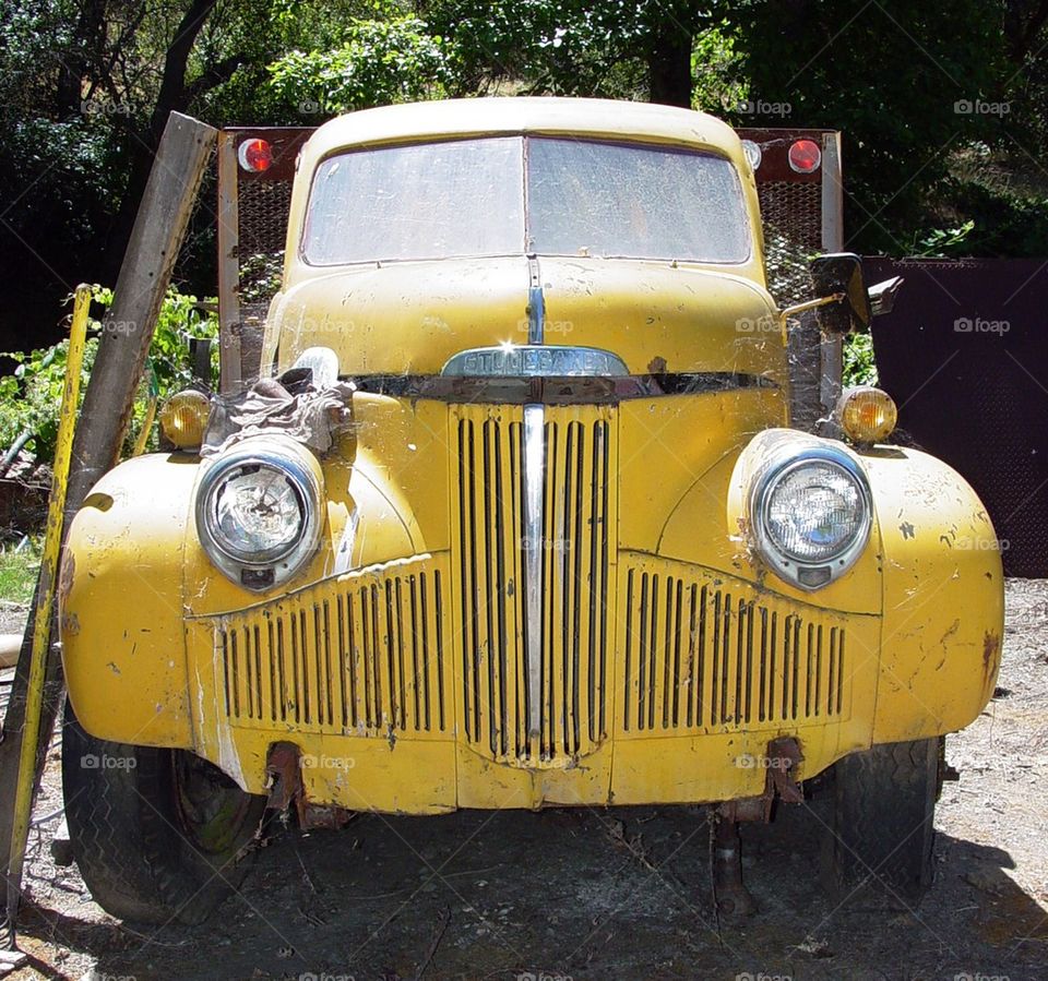Yellow Studebaker pickup truck